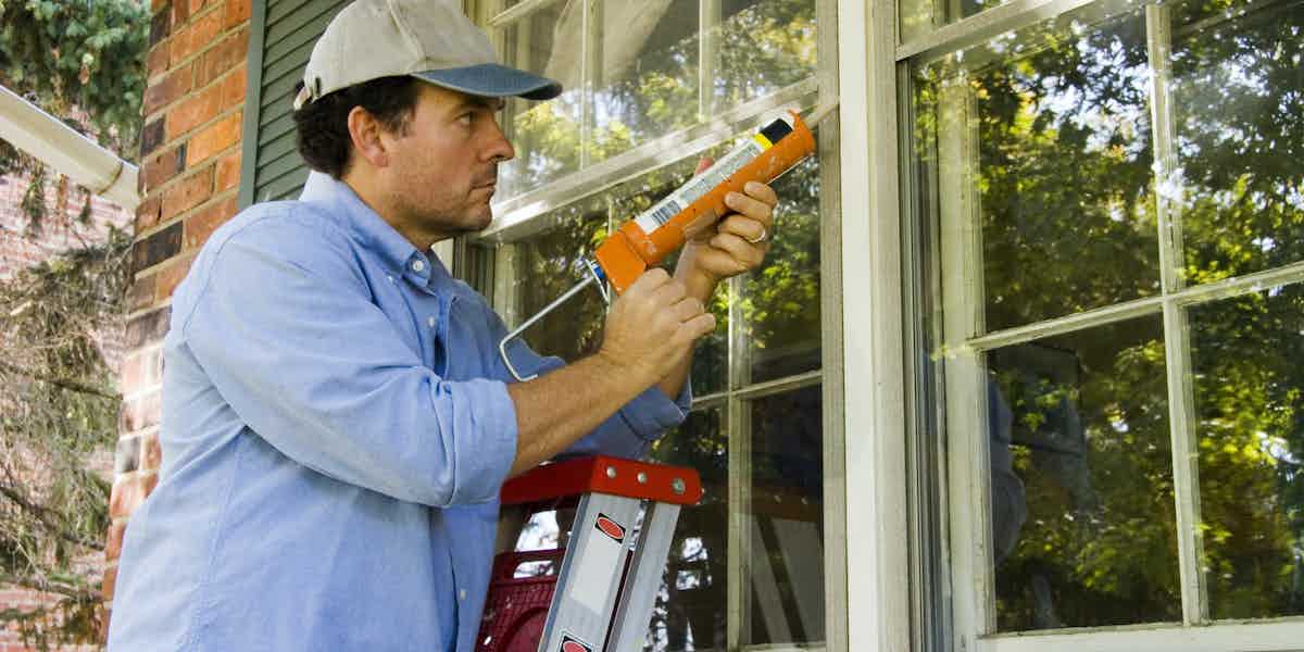 Person Doing Window Maintenance