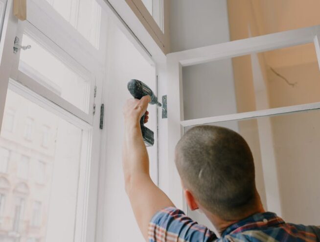 Window Repair Contractor Repairing a window