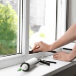 person doing a window repair
